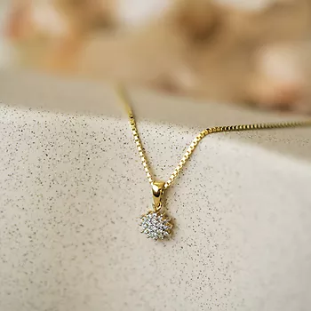Bilde nummer 2 av Pan Jewelry, Anheng i 585 gult gull med rosett og diamanter 0,13 ct