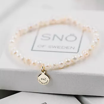Bilde nummer 2 av Snö of Sweden Judy, Smykkesett med strikkarmbånd og øredobber i forgylt messing med perler