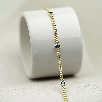 Bilde nummer 2 av Pan Jewelry, Armbånd i forgylt 925 sølv med lyse blå zirkonia